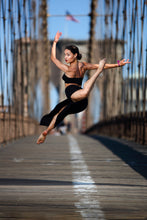 A Leaping Look Over The Shoulder On The Brooklyn Bridge by Kevin Richardson, Archival Pigment Print