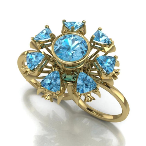 Fish Double Ring by Lisa Lesunja, Yellow Gold 750 18K with 7 Trillion Cut Swiss Blue Topaz 4.88ct. and 1 Brilliant cut Swiss Blue Topaz 3.52ct. (7576)
