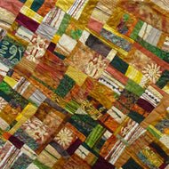 "Sunlit Boulders" by Ann Baldwin May, Fiber Art Quilt